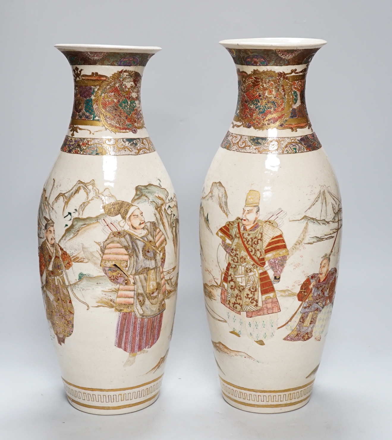 A pair of Japanese Satsuma vases, 40cm (a.f.)